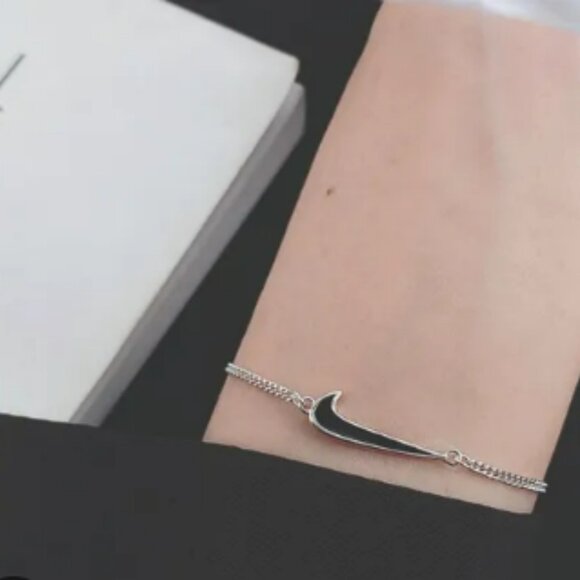 NIKE: Swoosh Bracelet - Picture 2 of 7
